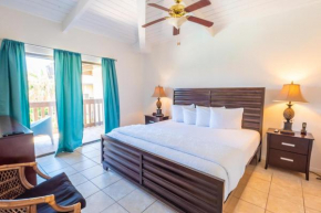 Cozy condo in Tiki complex with private beach access